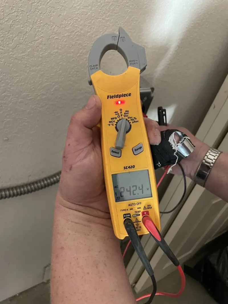 Voltage testing with clamp meter during Hot Tub / Pool Electrical Wiring in Hobart